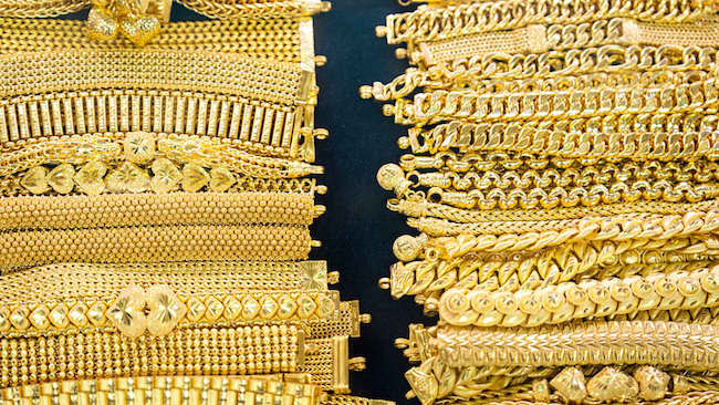 Vàng thế giới lên mốc 4,160 USD